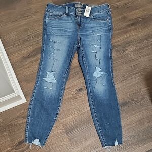 Torrid Blue Skinny Jeans with Modern Frayed Hem